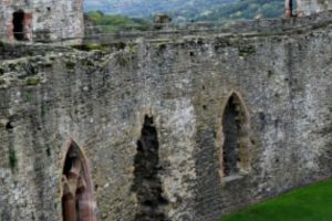 Visiting Wales in the United Kingdom is an experience unlike any other. There are over 400 castles in the country. Here are some to not miss out on. #wales #castles #bucketlist #wanderlust #tralveler #ourroaminghearts | Visiting Wales | Castles in Wales | Bucket List | United Kingdom Travel