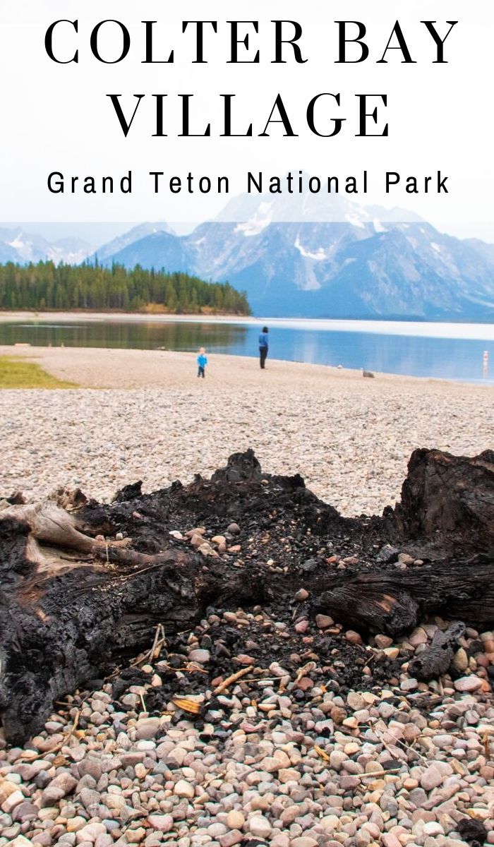 Just off the shores of Jackson Lake with the Grand Tetons in the background, lies Colter Bay Village. The perfect location for a family vacation! #grandtetons #nationalpark #ourroaminghearts #colterbayvillage #jacksonlake | Jackson Lake | Grand Teton National Park | National Parks | Colter Bay Village | Wyoming Travel | Grand Teton Mountains | Family Vacation | Traveling with kids