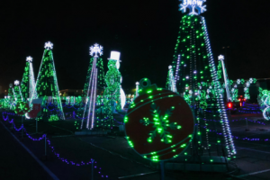 You are about to get a front-row seat to the largest animation Christmas lights show in the world. Bring the whole family for this adventure! #OurRoamingHearts #ChristmasLights #Arizona #Georgia #Tempe #Glendale #Marietta #HolidayActivies #FamilyFun | Family Fun For Christmas | Christmas Light Shows | Tempe Arizona | Glendale Arizona | Marietta Georgia | World Of Illumination | Christmas Traditions
